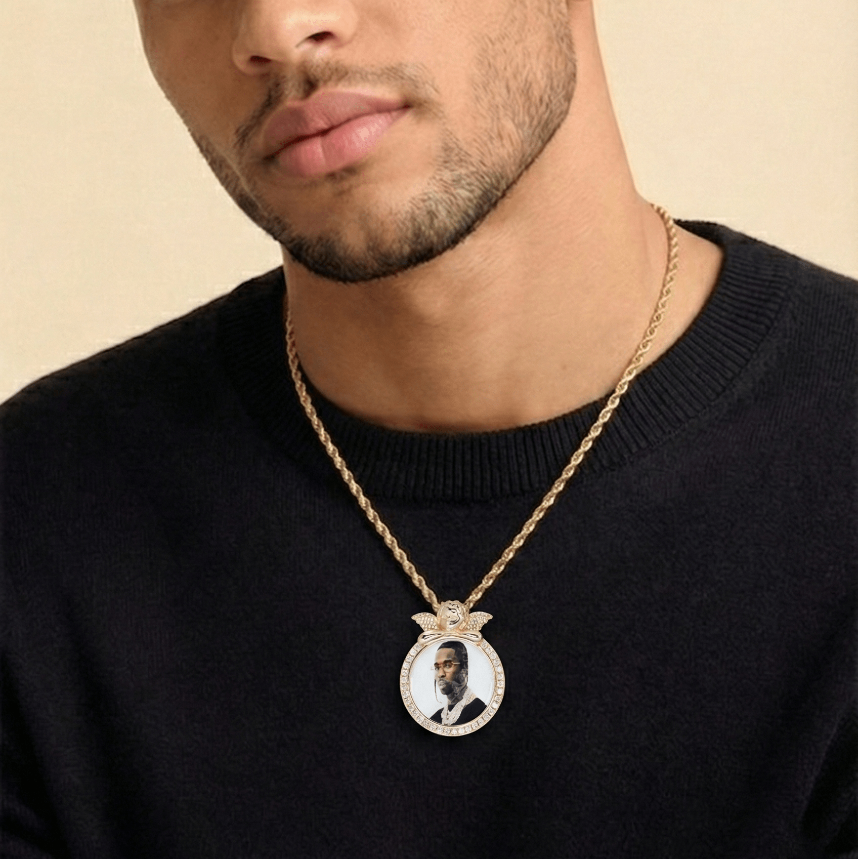 Male model wearing CRNCY's regular size Angel Photo Pendant with a 14k Gold Finish, with a 20 inch length necklace.