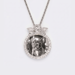 The front side of CRNCY's regular size Angel Photo Pendant with a silver finish. The front side features prong-set diamonds around the photo, angel, and bale. The front side shows the customer's photo selection.