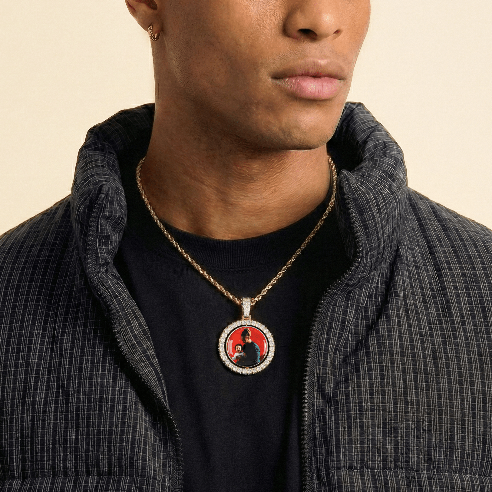 Male model wearing CRNCY's Double Sided Photo Pendant with a 14k Gold Finish, with a 18 inch length necklace.