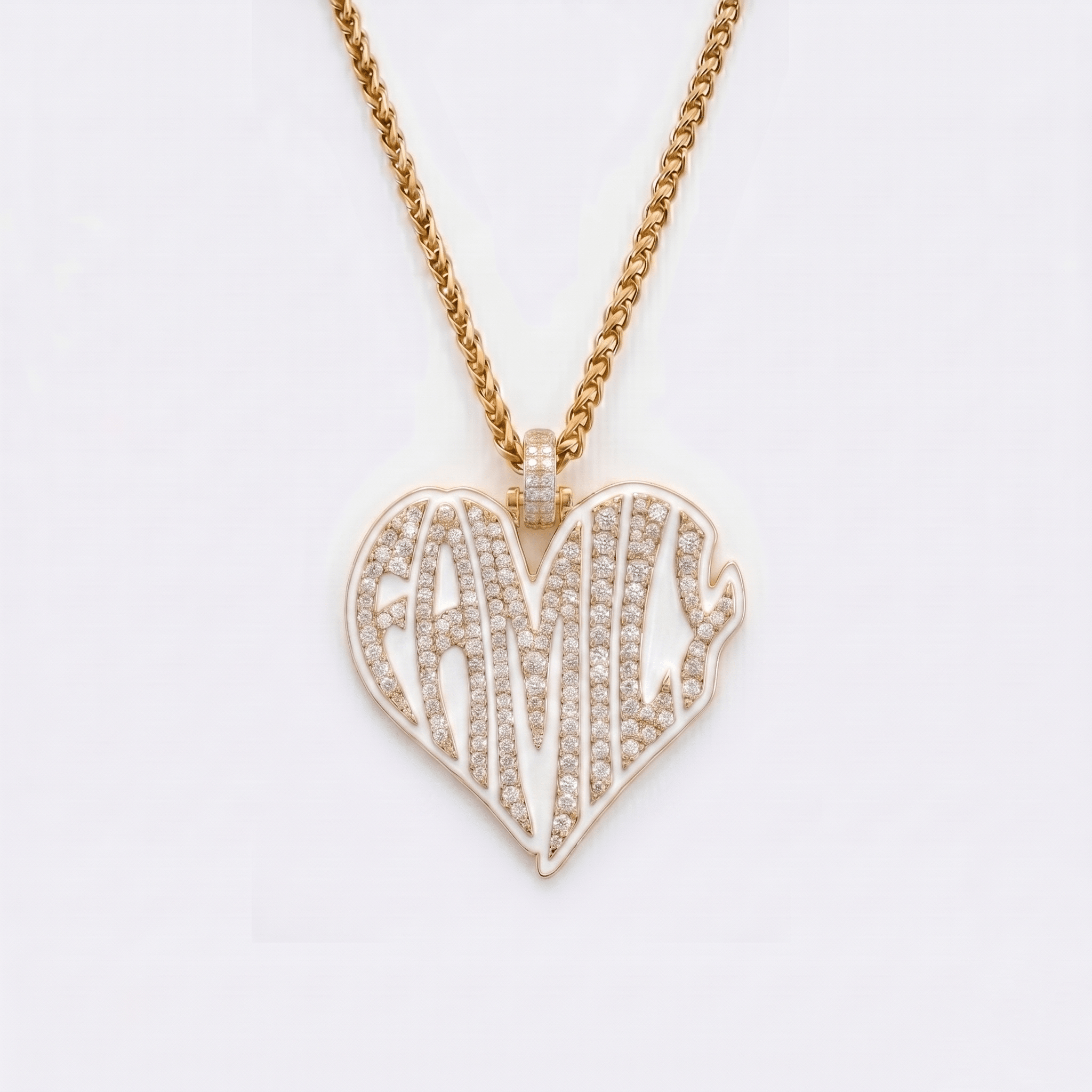 The front side of CRNCY's Family Heart Photo Pendant with a 14k gold finish. The front side features prong-set diamonds placed inside each letter, surrounded by colored jewelry enamel to outline the letters. 