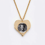 The back side of CRNCY's Grandpa Heart Photo Pendant. The back side has a polished appearance with a circular photo place directly in the center. The photo is selected by the customer.