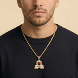 Male model wearing CRNCY's Regular size Heaven's Gates Photo Pendant with a 14k Gold Finish, with a 20 inch length necklace.